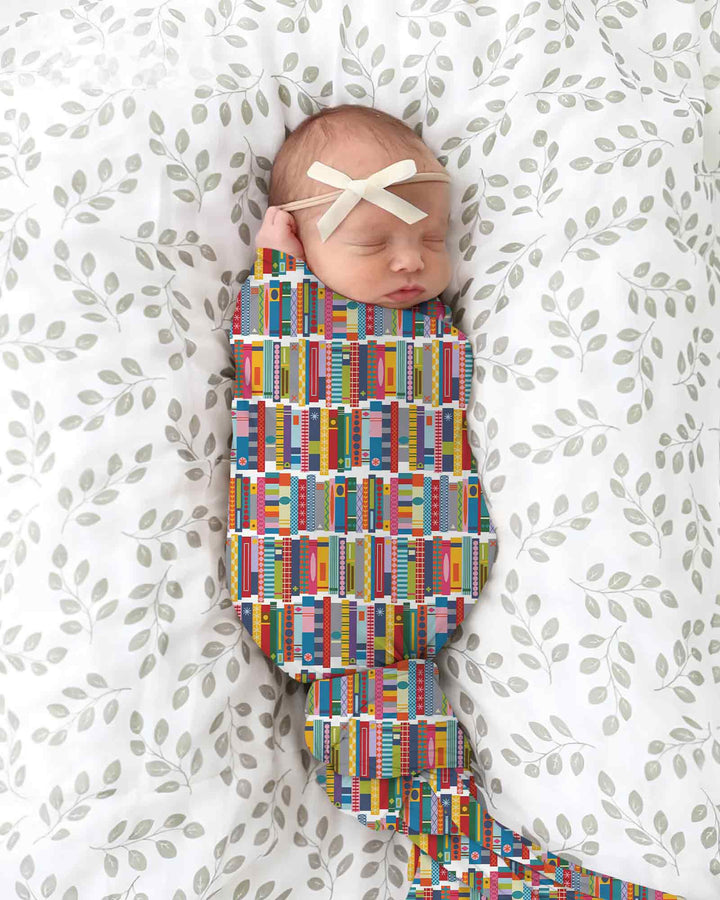Rainbow Bookshelf swaddle blanket