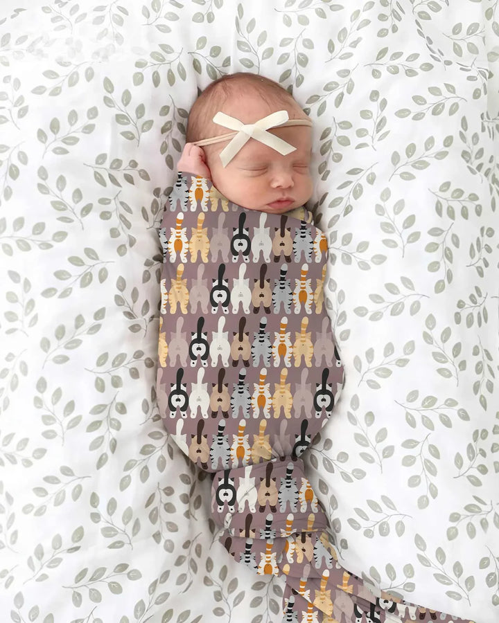 Cheeky Tails swaddle blanket