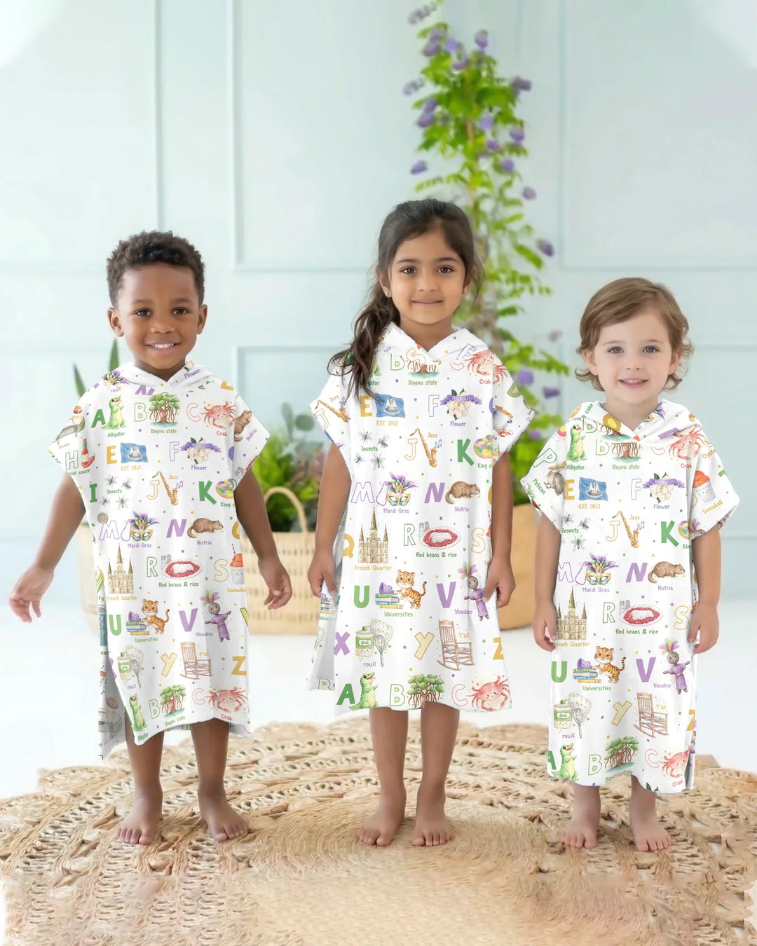 Poncho de Natación de Bambú "Alfabeto de Luisiana"