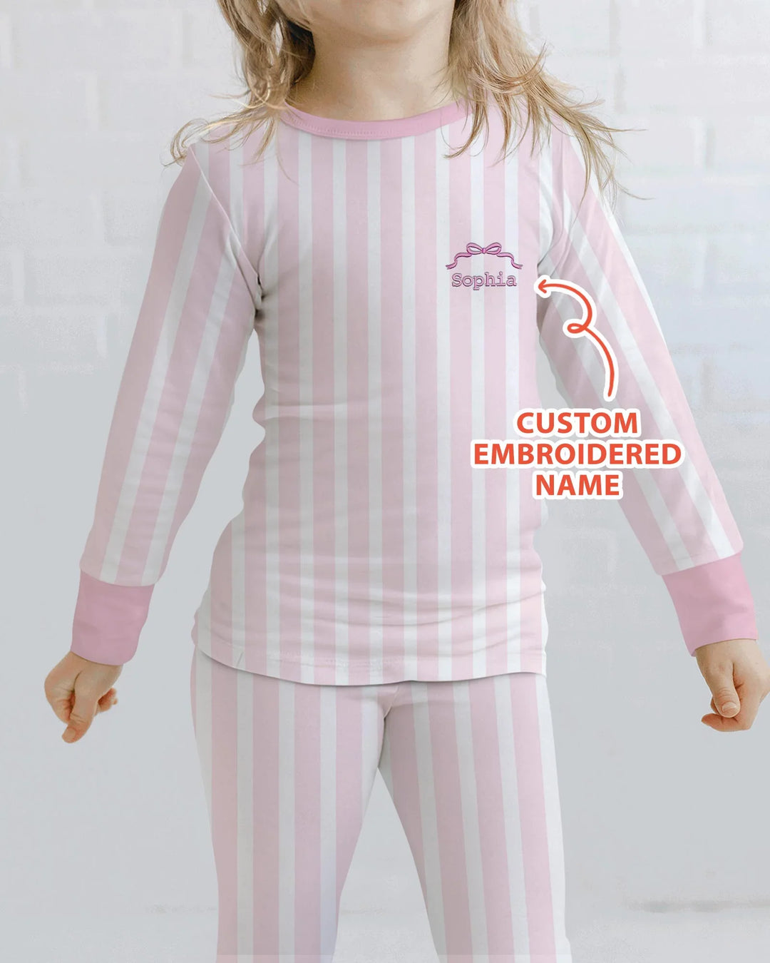 Pijama de dos piezas de bambú rosa con rayas bordado personalizado de manga larga para bebé