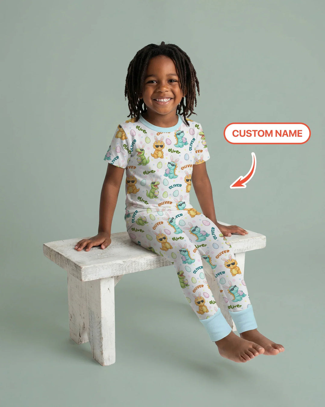 Custom Name Dinosaur on the Hunt Two Piece Short Sleeve Pajama Set