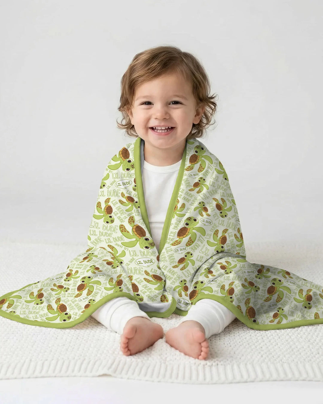 Manta de bambú padre e hijo con diseño de tortugas