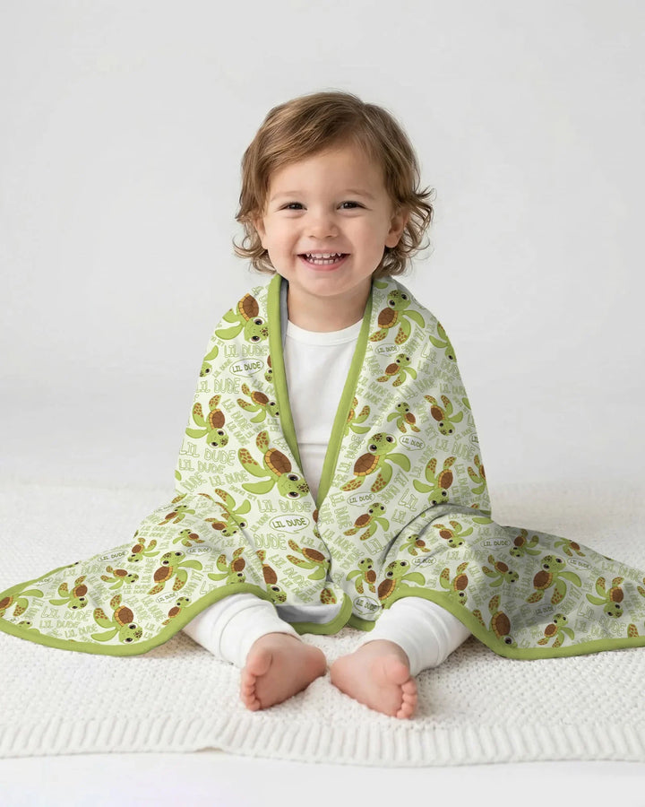 Manta de bambú padre e hijo con diseño de tortugas
