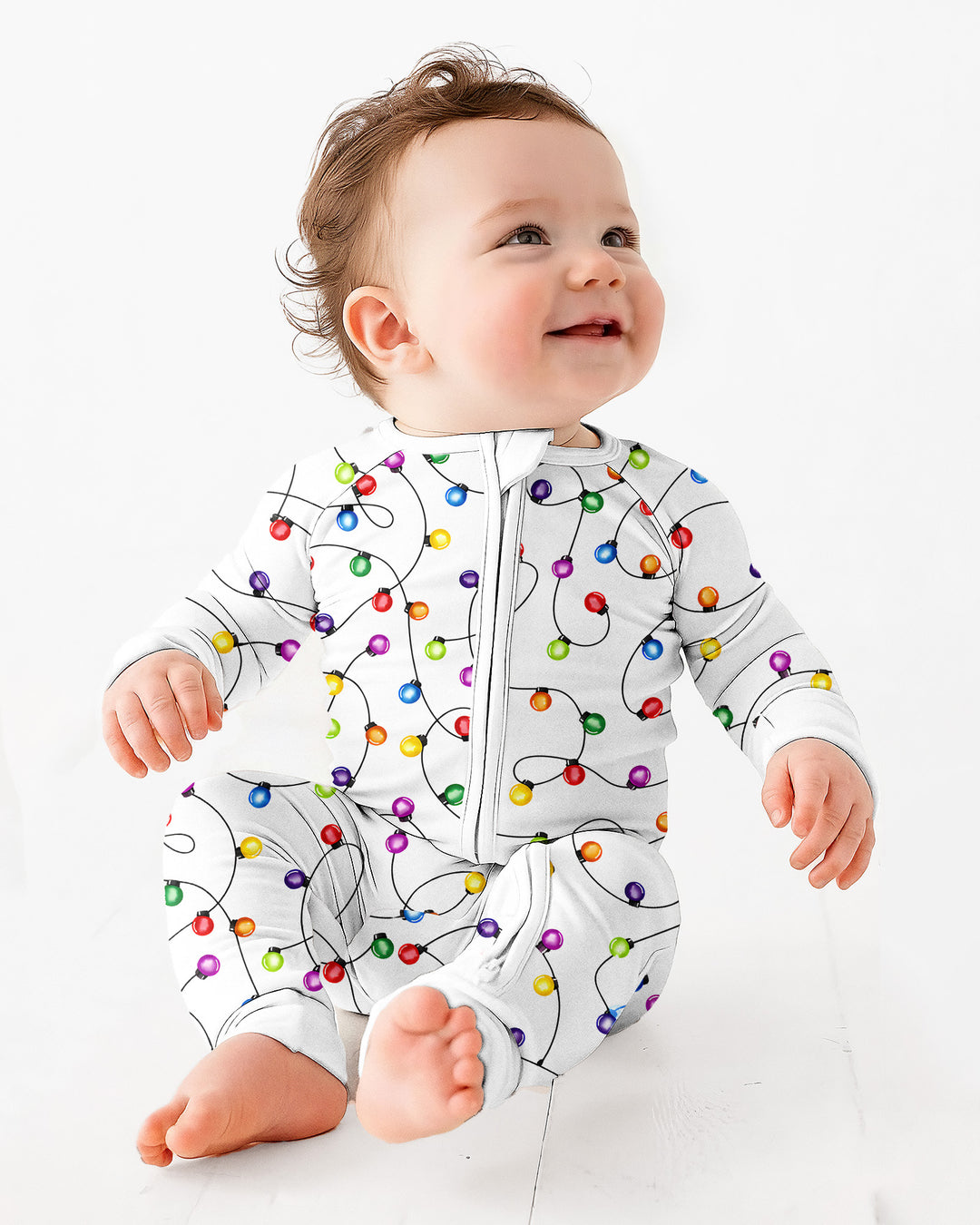 Babys erster Weihnachtslichter-Schlafanzug – Bunt &amp; Gemütlich