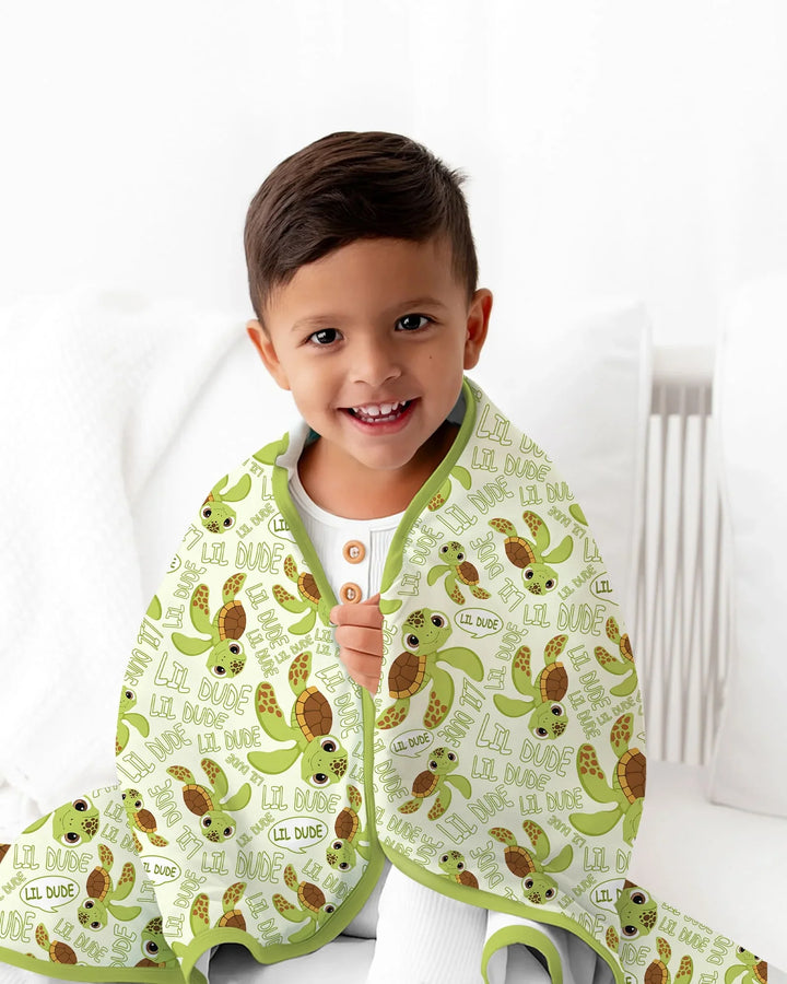Manta de bambú padre e hijo con diseño de tortugas